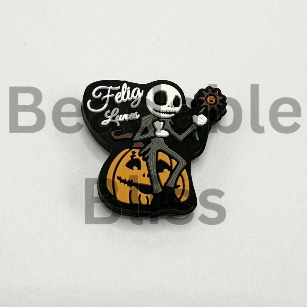 Jac in Suit sits on a Pumpkin Small Flower Silicone Focal Beads