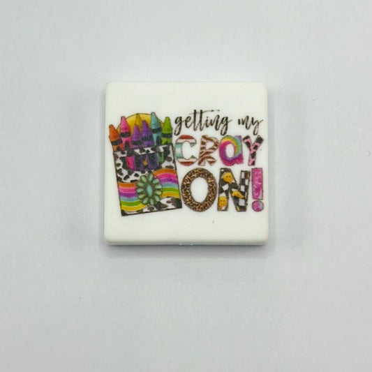 Colorful Crayons in a Box with Text ''Getting My Cray On'' Silicone Focal Beads