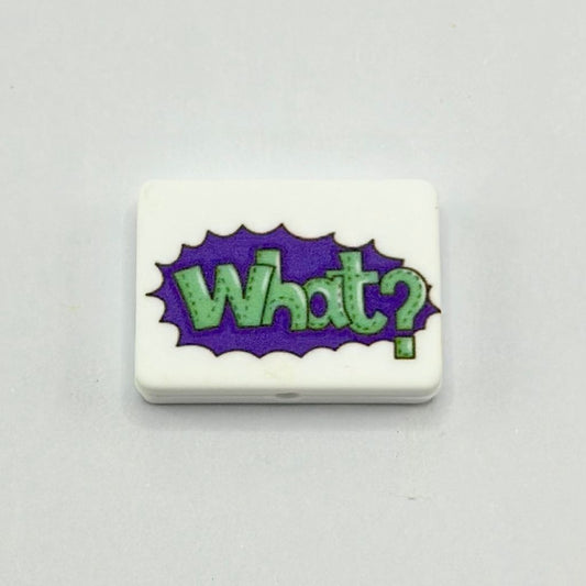 The Text What on Purple Background Silicone Focal Beads